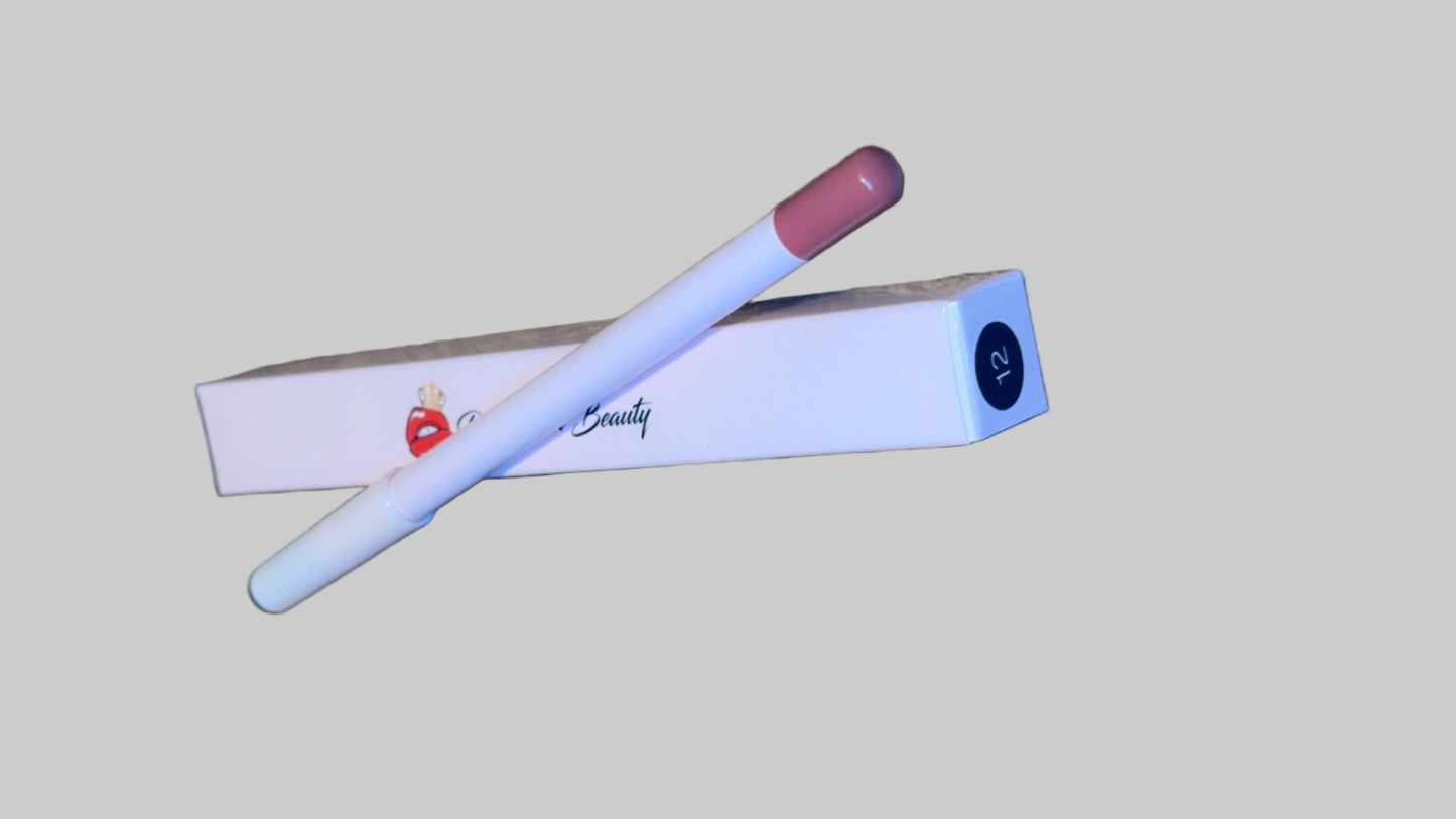 Lipstick with cap on a textured surface