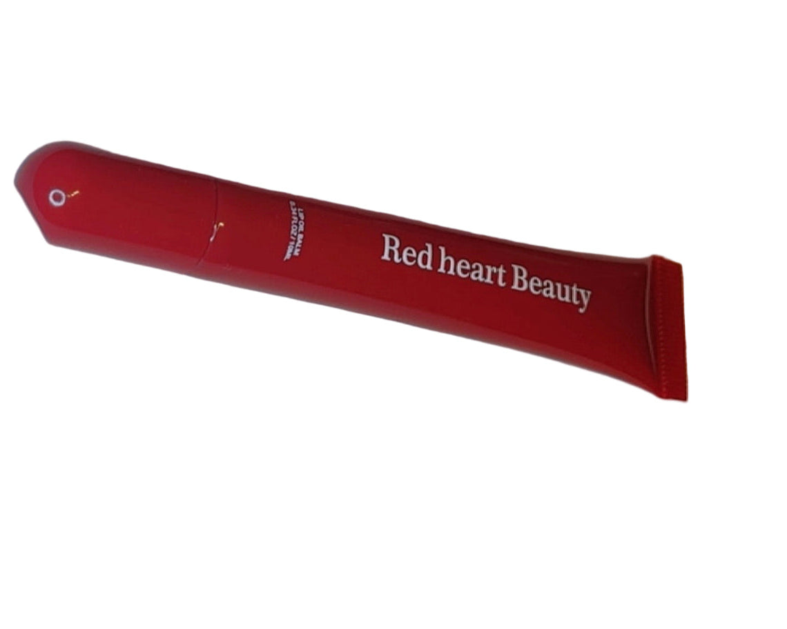 Red tube of 'Red heart Beauty' on a white background